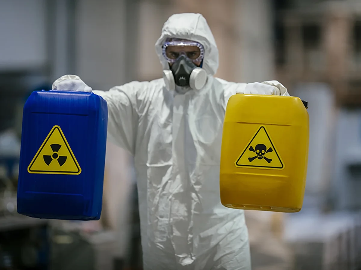 Biohazard cleanup technicians in protective equipment at a remediation scene in Auburn, WA